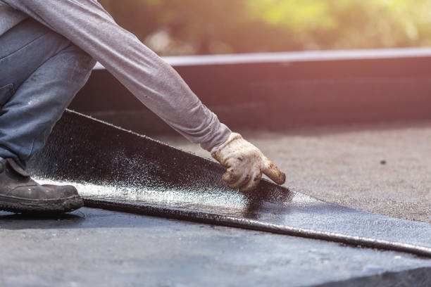 Professional Emergency Waterproofing technician working in Elsie, MI